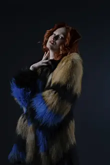 Fashionable Female Drucke: Model stands gracefully in a studio
