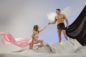 Romanticism Concept Image Drucke: Two models engage in a creative interaction