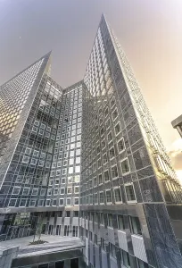 Modern Architecture France Drucke: Modern building, Silver skyscraper in the sunset