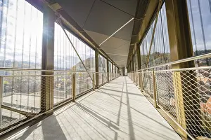 European Modern Architecture Drucke: Modern footbridge with sun rays and shadows through the grid