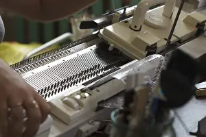 Textile Manufacturing Process Drucke: Modern machine for knitting on weaving mill