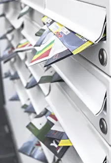 Shallow Depth Of Field Drucke: Modern mailboxes filled of leaflets