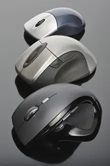 Black Background Studio Shot Drucke: Modern wireless computer mouses on black background