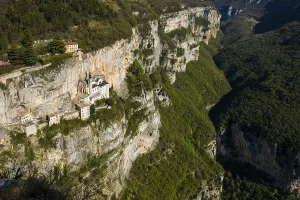 Sacred Building In Europe Drucke: Monastery on a slope in a gorge