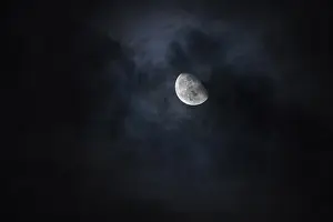 Nocturnal Atmosphere Drucke: Moon in the night sky with clouds