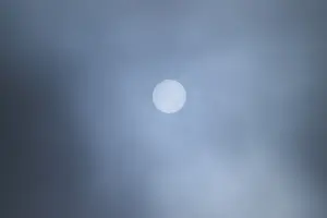 Bavaria Evening Sky Drucke: Moon shining through clouds at evening