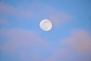 Evening Light In Europe Drucke: Moon at sunset, evening, clouds