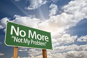 Road Safety Signs Drucke: No more, not my problem green road sign with dramatic clouds and sky