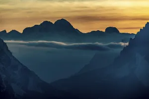 Mountain Silhouette At Sunset Drucke: Mountain top of the Dolomites at sunset