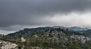 Uninhabited Mountainous Region Drucke: Mountain landscape with dramatic clouds