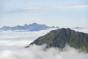 Northern Europe Nature Scene Drucke: Mountain peaks above the clouds