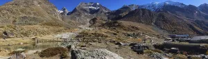 Mountainous Region Switzerland Drucke: A mountain range under a clear blue sky