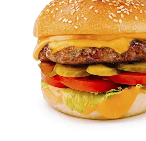 High Calorie Snack Drucke: A mouthwatering cheeseburger is placed on a clean surface