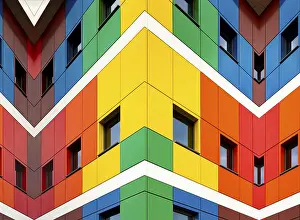Educational System In Europe Drucke: Multi-colored facades of the school with black window frames