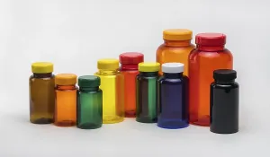 Medical Packaging Solutions Drucke: Multi colored transparent plastic pill jars on a white background