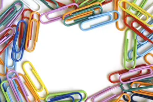 White Background Office Supply Drucke: Multicolored paper clips on a white background