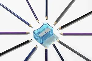 Educational Institution Concept Drucke: Multicolored pencils and sharpener isolated on white background