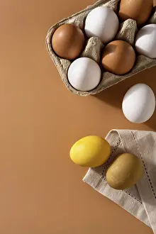 Natural Easter Eggs Drucke: Naturally dyed easter eggs on beige background