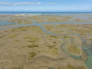 Aerial View Of Marshland Drucke: Network of channels and streams at low tide