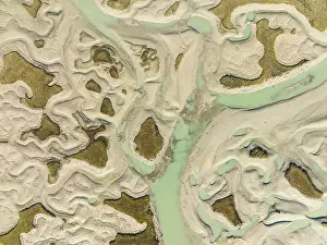 Aerial View Of Marshland Drucke: Network of channels and streams at low tide
