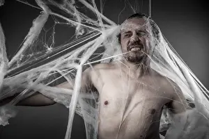 Halloween Geometry Art Drucke: Network. man tangled in huge white spider web