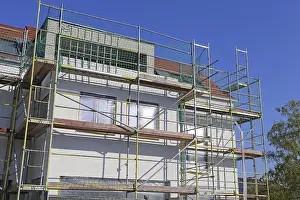 Residential Building Design Drucke: New building with completed basic rendering of the exterior facade New building with completed basic rendering of