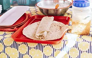 Traditional Nicaraguan Meal Drucke: Nicaraguan quesillo made and served on the table