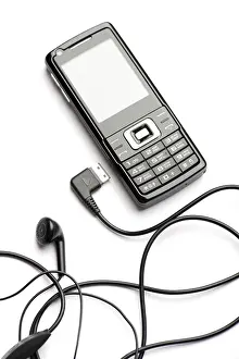 Electronic Communication Device Drucke: Object on white - mobile phone with head set