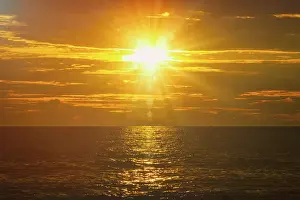 Rocky Coastline Landscape Drucke: Ocean sunset with great cloudscape