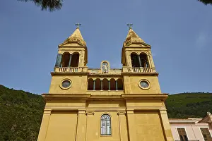 Uninhabited Church Exterior View Drucke: Ochre-coloured facade, upper part