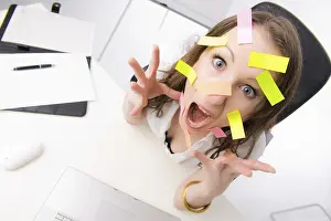 Office Worker Stress Drucke: Office worker with many post-its on her face