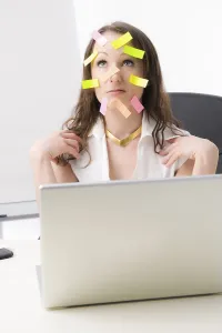 Office Worker Stress Drucke: Office worker with many post-its on her face