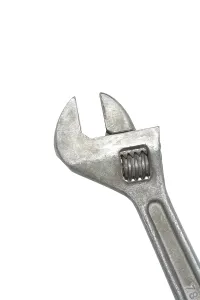 Studio Shot Of Wrenches Drucke: Old adjustable spanner isolated on white background