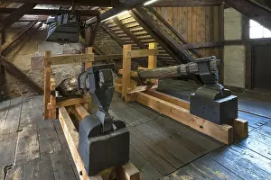 Industrial Museum Lauf Drucke: Old blacksmith's hammers and above an old bellow of 1875