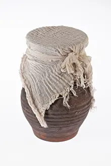 Isolated Studio Background Drucke: Old ceramic pot on an isolated studio background