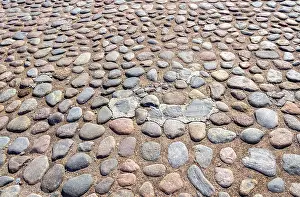 Historic City Centre Image Drucke: Old cobblestone pavement as creative background texture