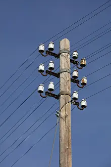 Deserted Power Pole Drucke: Old power pole with ceramic insulators
