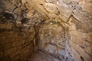Historic Building Structure Drucke: Old, rustic interior with stone walls and structural details