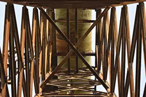 Industrial Building Design Drucke: The old rusty water tower tilted