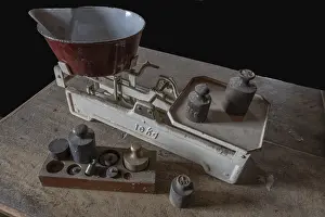 Southern Europe Images Drucke: Old scales with weights in a former corn mill