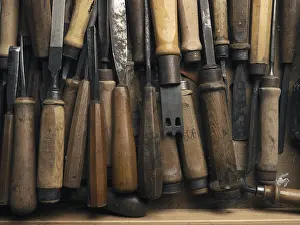 Handmade Goods Drucke: Old used chisel in a workbench drawer