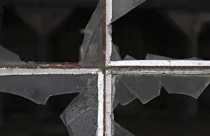 Deserted Daytime Scene Drucke: Old window cross with broken pane
