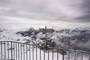 Cloudy Sky Over Mountains Drucke: Another onset of winter in May