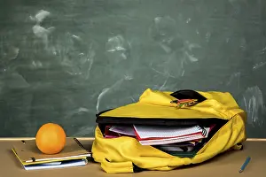 Educational Institution Equipment Drucke: Open backpack orange table