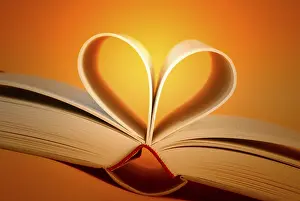 Studio Shot Of A Book Drucke: Open book in heart shape