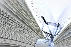 Stationery Supplies Drucke: Open book isolated on a white background