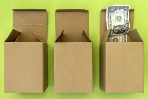 US Dollar Note Picture Drucke: Three open boxes and dollar bulging out of one of them