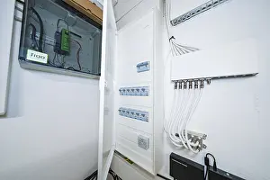 German Architecture Style Drucke: Open electrical distributor in bright technical room