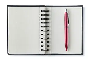 Desk Accessories Drucke: Opened Notepad With Red Ballpoint Pen Isolated