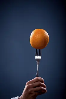 Fresh Healthy Eating Drucke: Orange on a fork